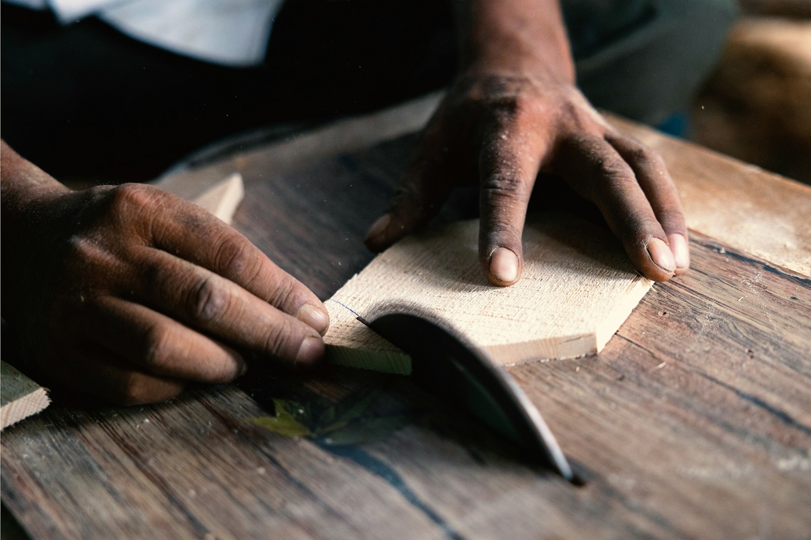 The signature ruche detail being formed by hand